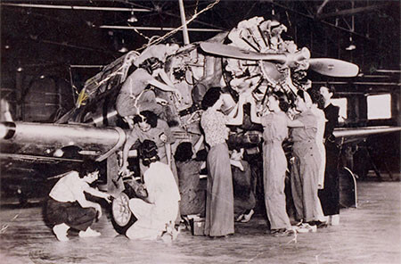 MOSTH Angelica Gonzalez woman with the only head bandana working plane web