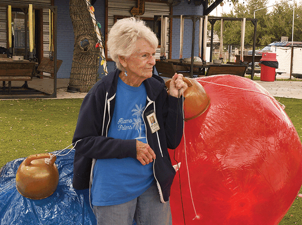 aLand Diane carrying 2 balls USE PRINT
